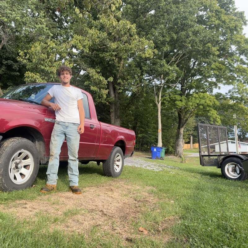 Trevor Thomas, owner of Trevor's Lawn and Tree Services, on a job site in the New River Valley, VA